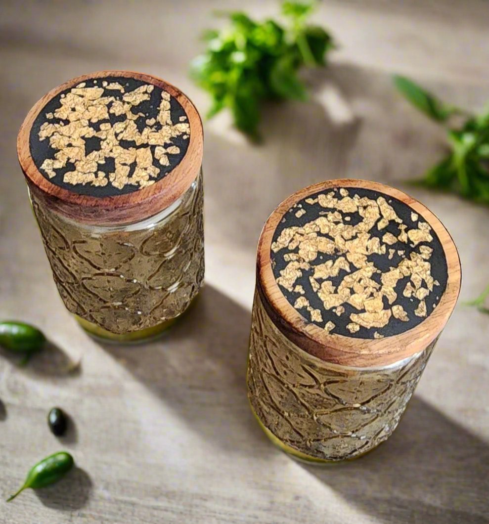 Gold set of jars with decorated lids