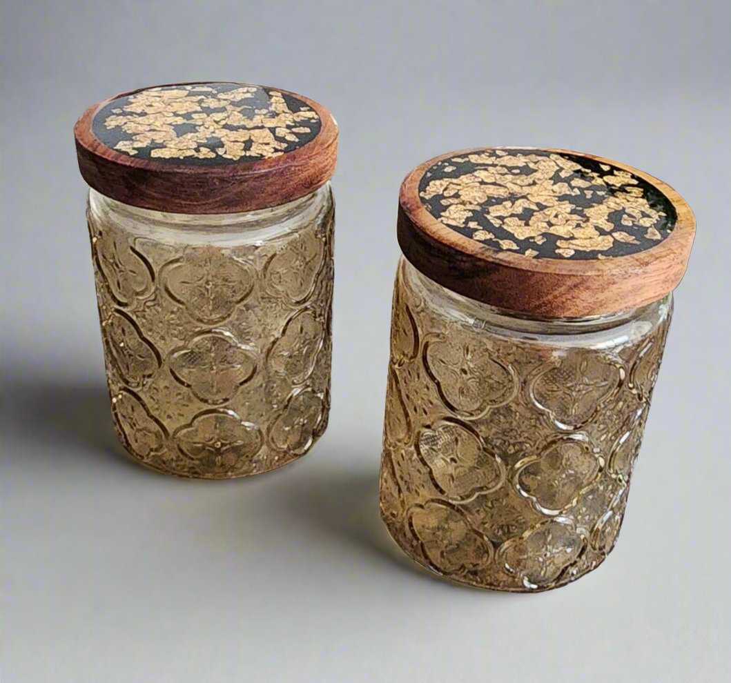Gold set of jars with decorated lids